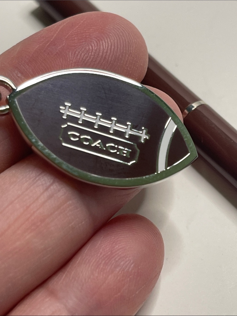 Coach Brown Enamel Football Keychain with Silver Hardware and Coach Pen - Picture 5 of 6